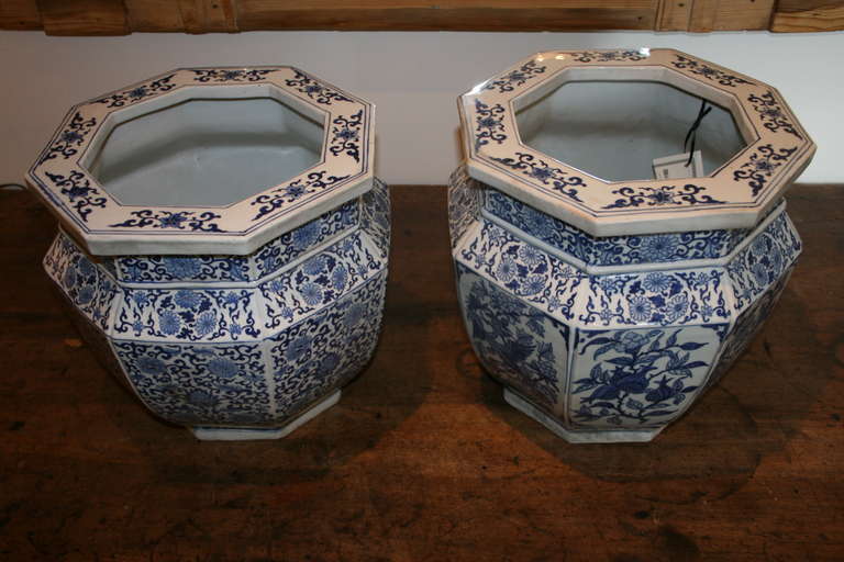 Pair of matched Chinese export octagonal planters with phoenix birds and  chrysanthemums. 
ACC-69795.