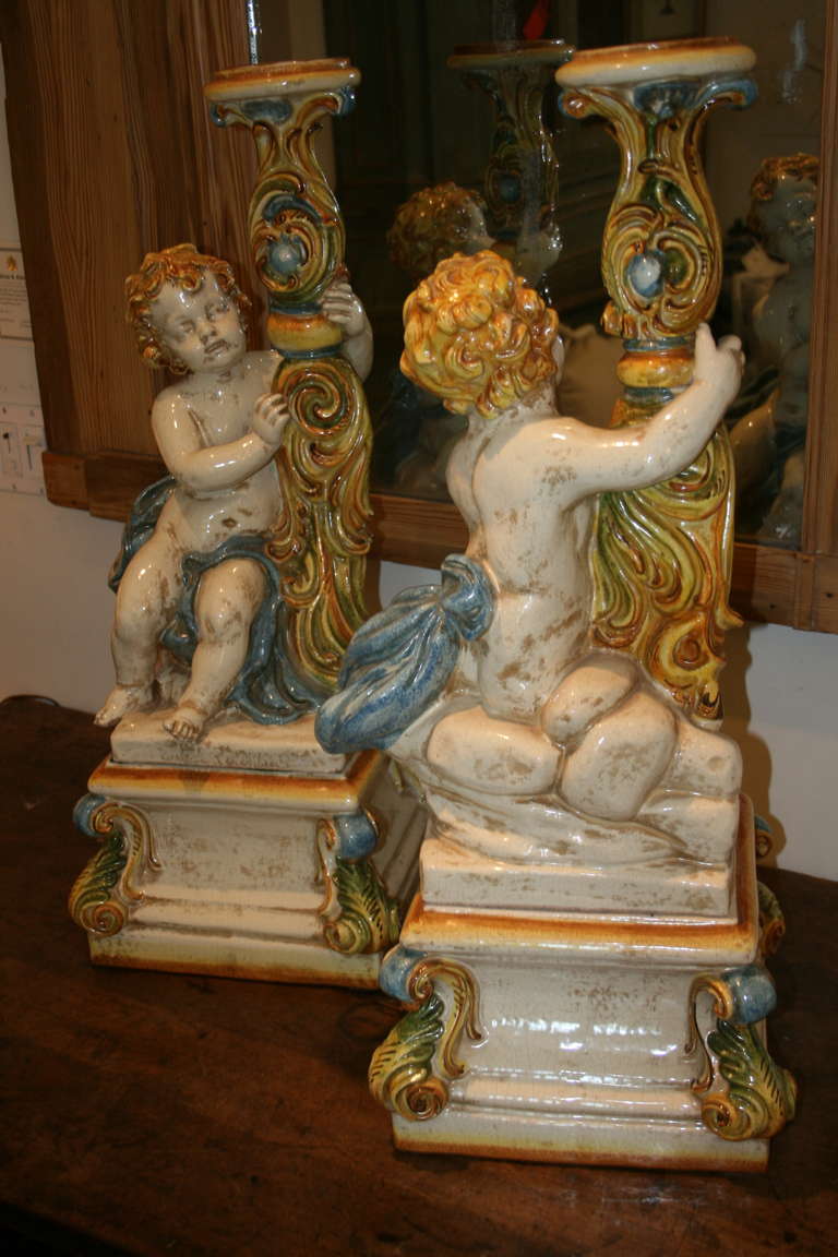 Contemporary Large Pair of Italian Majolica Putti Candleholders For Sale