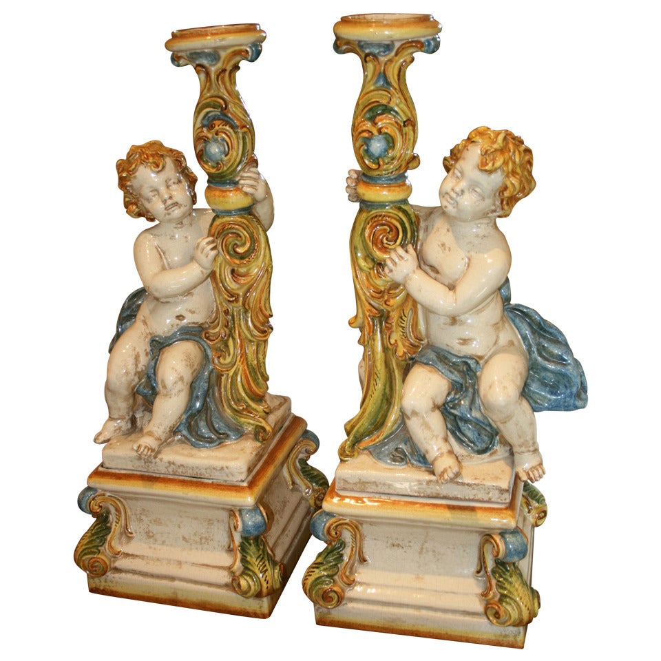 Large Pair of Italian Majolica Putti Candleholders For Sale