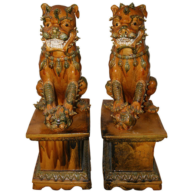 Pair of Large Ochre-Glazed Foo Dog Sculptures