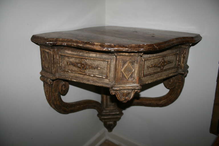 Large Louis XV painted wood corner console with simulated marble top.
PBI-CRIM25.