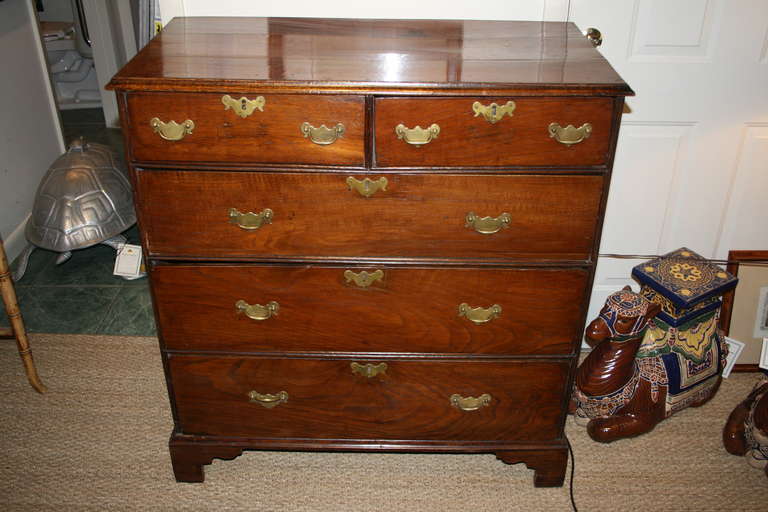 Chest of drawers George III elm lined drawers.