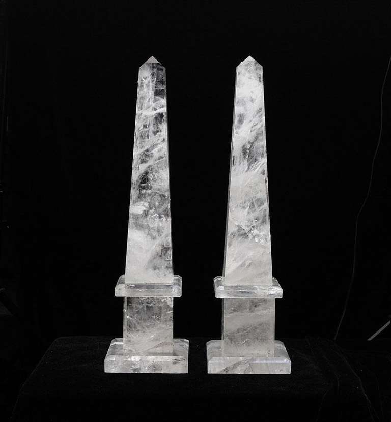 Incredible fine pair of rock crystal quartz obelisks, 15.5 inches tall.