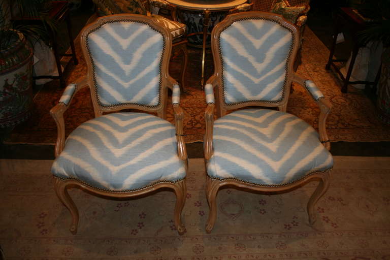 Pair of fauteuils with zebra blue and cream upholstery.