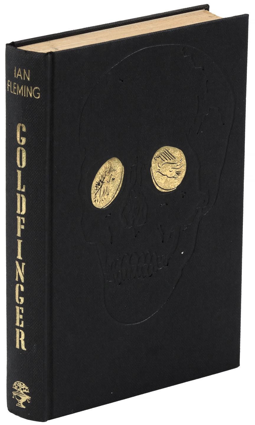 Fine, first edition copy in black cloth with gilt spine lettering and golden coins serving as eyes on a blind-stamped skull on the front panel. The dust jacket is also fine and first issue. 

A lovely copy of the author's seventh James Bond novel