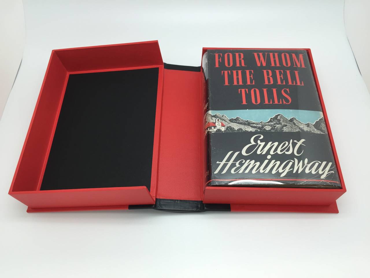 This is a striking, first edition copy of Hemingway's classic novel surrounding the events of the Spanish Civil War and the exploits of Robert Jordan, an American fighting on behalf of guerrillas during the conflict.  The book includes the autograph