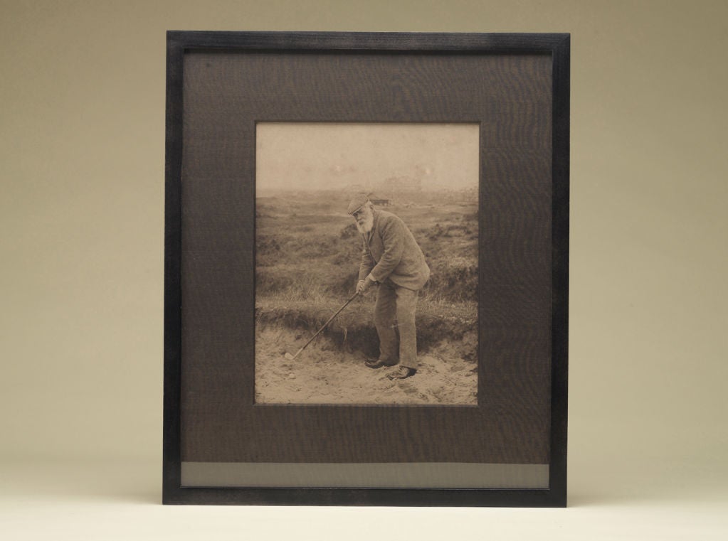 This 1903 Patrick James photograph is signed by its subject and one of golf’s most storied champions, Old Tom Morris. Known as the Keeper of the Greens, Morris is captured by St Andrews photographer James in one of the many bunkers on the Old