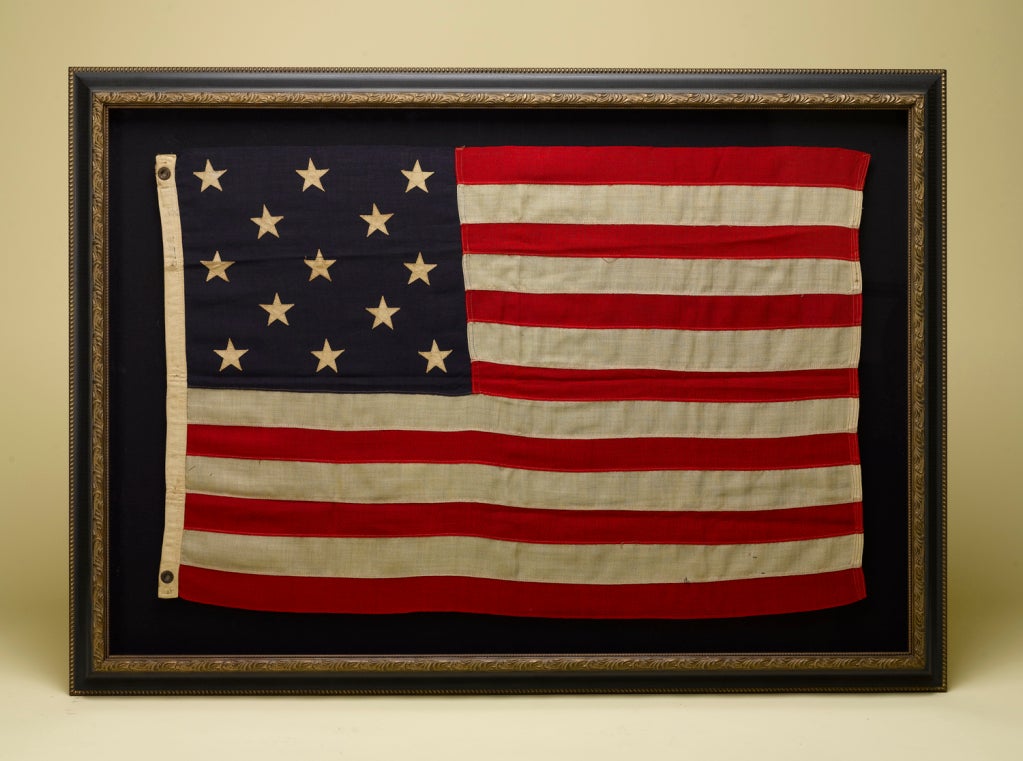 This is a 13-star U.S. flag known as a “Private Boat Ensign”, used first by the United States Navy, the practice of flying 13-star flags on the aft section of private yachts became quite popular in the late 19th century, and continuing through the