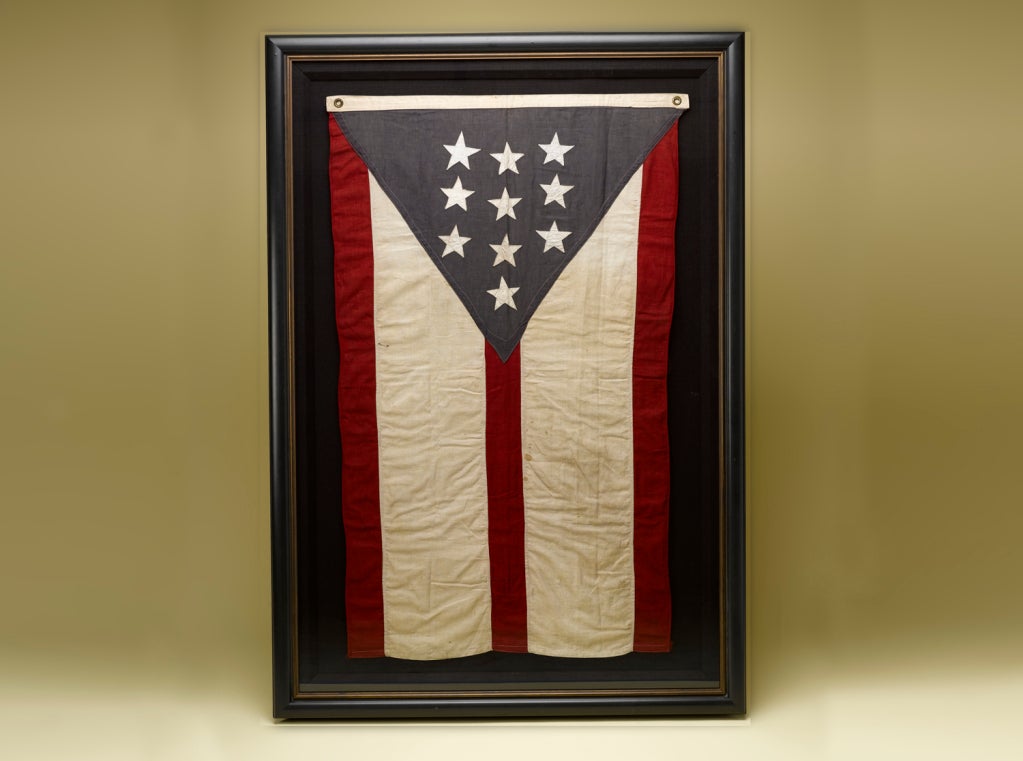 There were several flags associated with the Liberty Loan program during the First World War. The one shown in the contemporary poster below was awarded to businesses whose employees subscribed to the Third Liberty Loan to finance the War. As