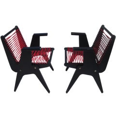 Pair of Arm Chairs evoking the style of Pierre Jeanneret