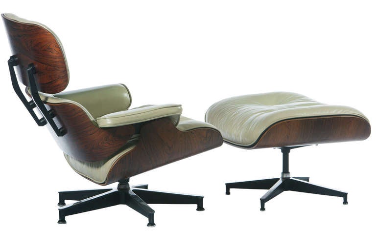 Iconic Eames design in scarce original cream -pale green colored leather and expressive grained rosewood shell. Manufactured by Herman Miller circa 1970's. With labels and in very good vintage condition.