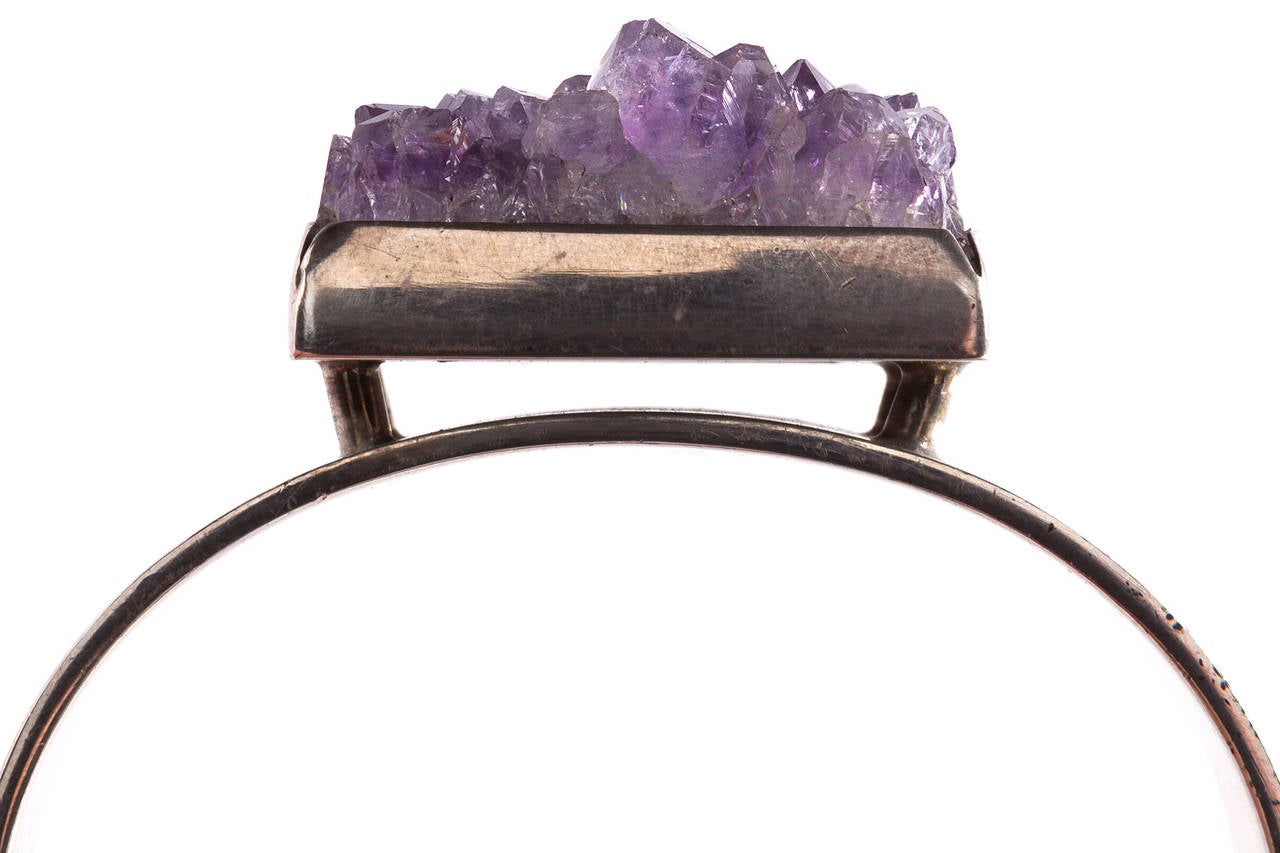 Interesting Scandinavian cuff from Danish jewelry designer Bent Knudsen in sterling with amethyst. Signed with impressed manufacturer's mark to interior: [Sterling Denmark Bent K © 173].
