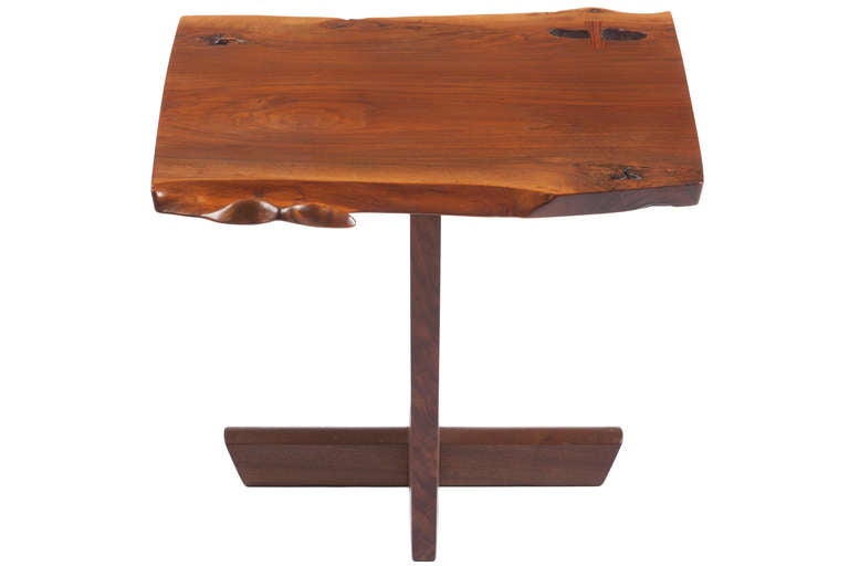 Exceptional Nakashima Ming 1 side or occasional table with a very expressive figured top. Two free-edges with knots, fissures, holes, and a single rosewood butterfly. Base with exceptionally expressive graining. Signed and dated. Table comes with