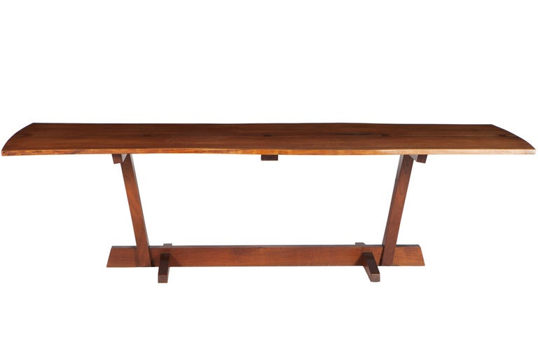 Monumental and extremely rare 9 foot Conoid dining table by George Nakashima. Tables of this size rarely come to market. Table with free-edges and 5 rosewood butterflies and in excellent condition. Table comes with provenance.