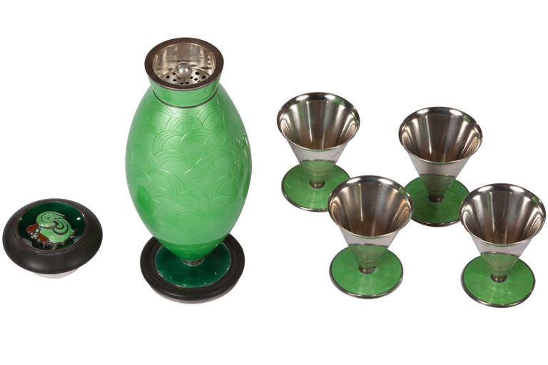Exquisite Norwegian enameled  David Andersen cocktail set featuring a beautifully decorated cocktail shaker and 4 sterling and enameled cups. Lep with intricate enameled rooster and ebony handle. Superb Art Deco object. Signed and dated with