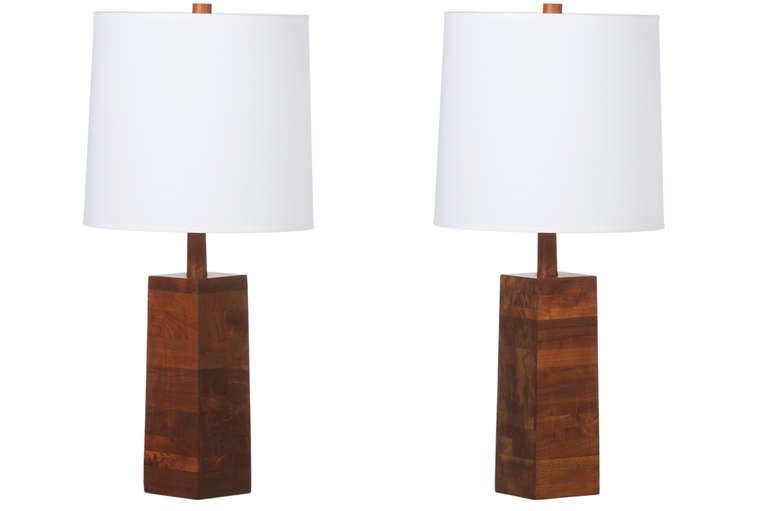 Stacked Walnut based lamps designed by Nicholas Marshall and Richard Lee for Marshall Studio, circa 1950's, with original wood finials.