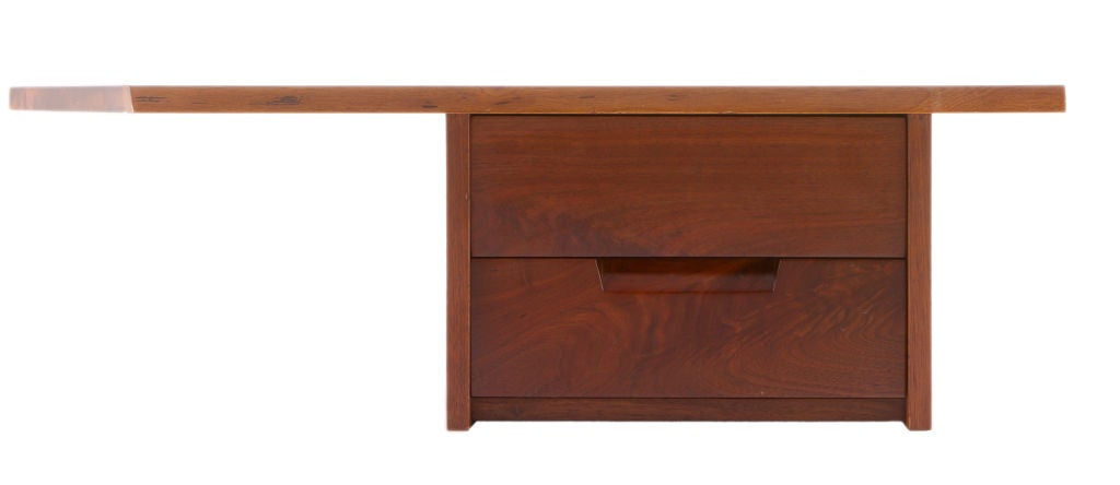 Three foot George Nakashima wall mounted shelf with 2 drawers and free edge overhanging top.Signed with clients name to back(Cook).Provenance included.