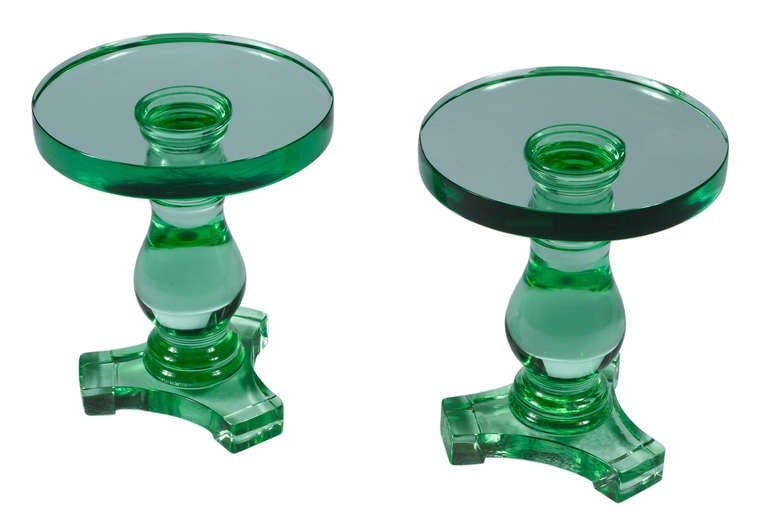 Pair of unique and interesting green glass side tables or pedestals. Heavy,well constructed tables made of solid glass. Most likely American. Manufacture unknown.