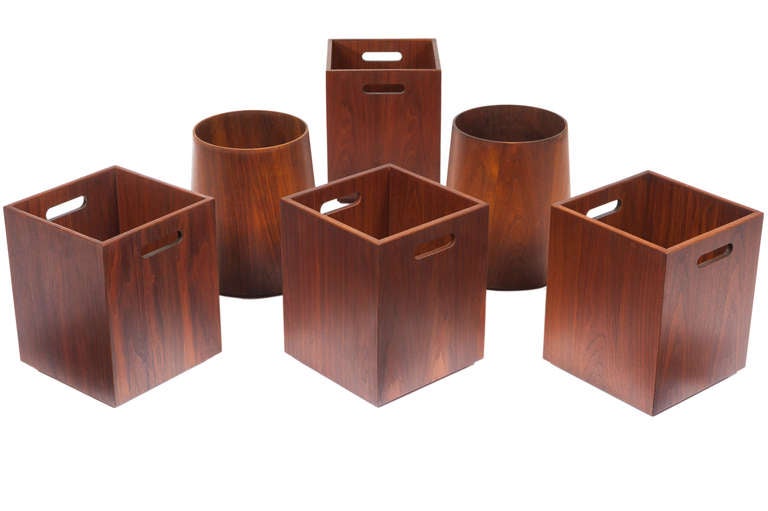 Nice collection of walnut Jens Risom wastebaskets in various shapes and sizes. Some with labels.