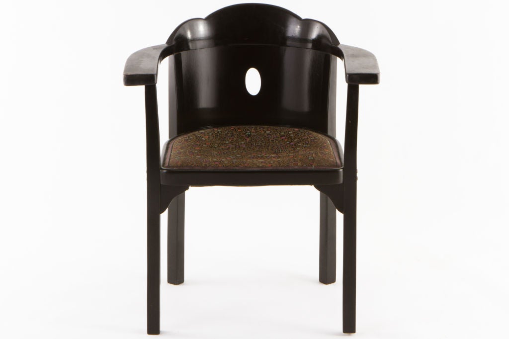 Elegant Hoffmann armchair manufactured by Jacob and Josef Kohn Austria. Lacquered wood with period Viensesse secessionist fabric . Documented in Gebrüder Thonet Vienna, Jacob & Josef Kohn, Renzi, pg. 259.