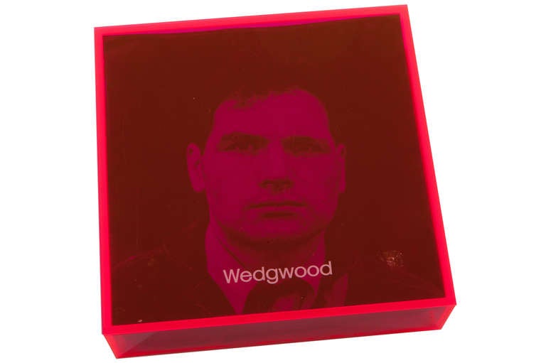 Interesting graphic multiple designed by Eduardo Paolozzi manufactured by Wedgewood. Consisting of 6 plates in the original neon pink cloth sleeves ,all of which are contained in original neon pink acrylic cube.Limited edition of 200 sets.