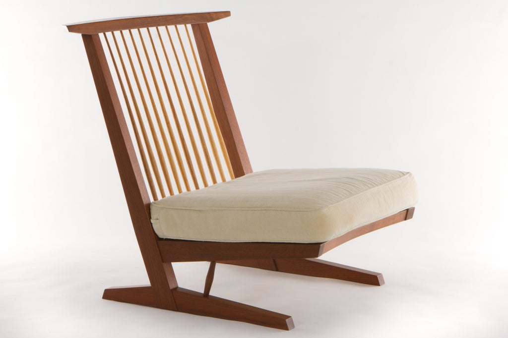George Nakashima Conoid cushion lounge chair.American black walnut frame with hickory spindled back.Signed and dated.Designed to have cushioned seat and optional cushion on back(not pictured).