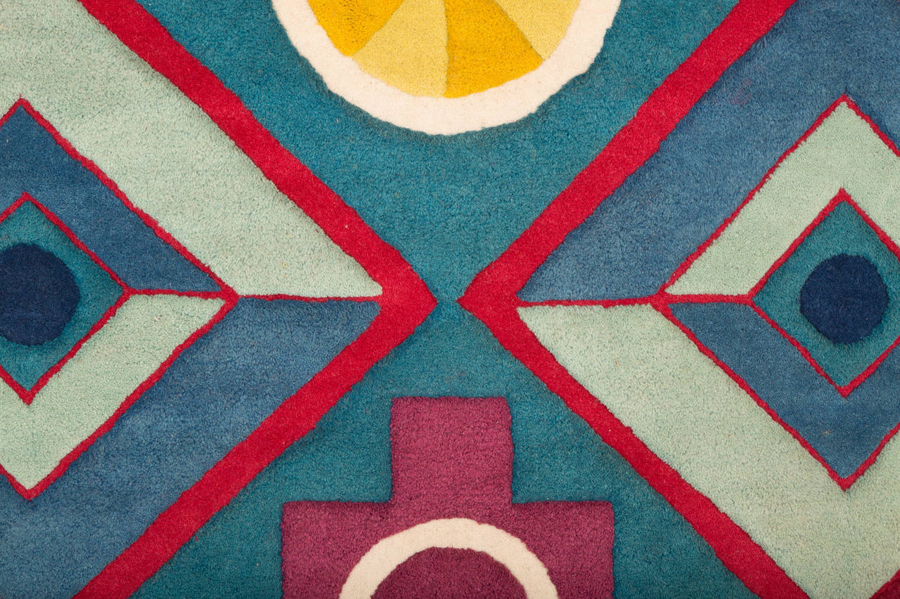 A striking wool tapestry made by artist George Ortman. George Ortman (b.1926) is an American born painter, sculptor and printmaker whose style uses geometry as a focal point. He has had solo exhibitions since 1953 and been in group exhibitions since