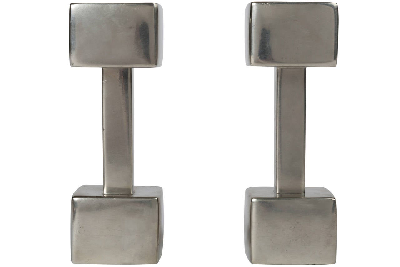Rare and fantastic minimal designed pewter candlesticks by noted jewelry designer Astrid Fog and manufactured by Just Andersen. Signed.