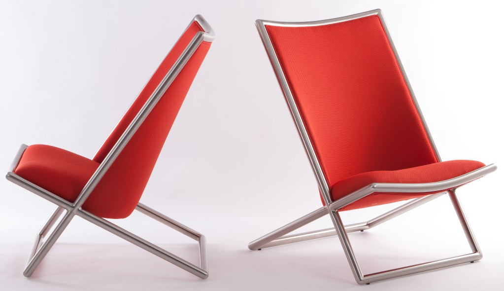 Pair of Ward Bennet Scissor lounge chairs in polished steel with red wool fabric.