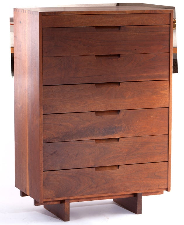 Rare seven drawer tall chest designed by George Nakashima. Chest in walnut with dovetail construction. Comes with full provenance.