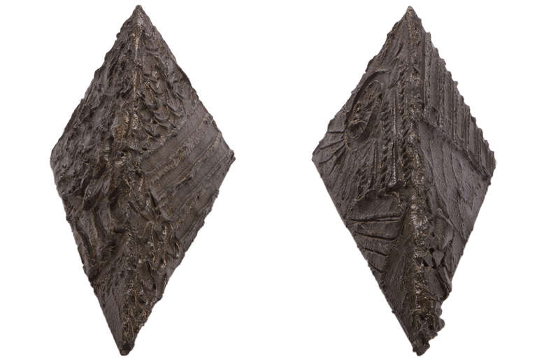 Pair of Paul Evans triangular sculpted bronze wall brackets. Internal steel frame mounts to wall to support a glass shelf of up to 5 feet.