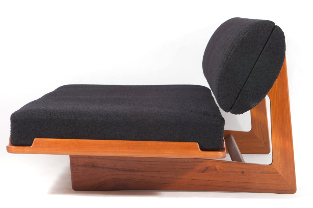 Cleverly designed daybed designed by Greta Jalk and manufactured by Jeppesen of Denmark.Teak and upholstered daybed with convertible 2 position seat and hinged back bolster concealing storage.Signed to bottom.