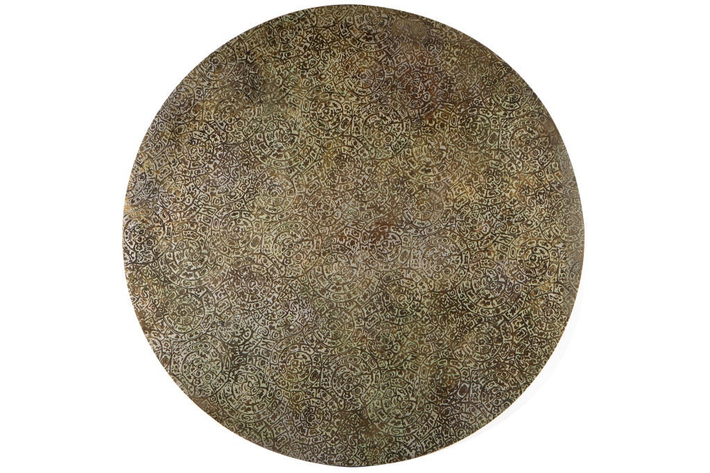 Acid-etched and patinated bronze round coffee table with 