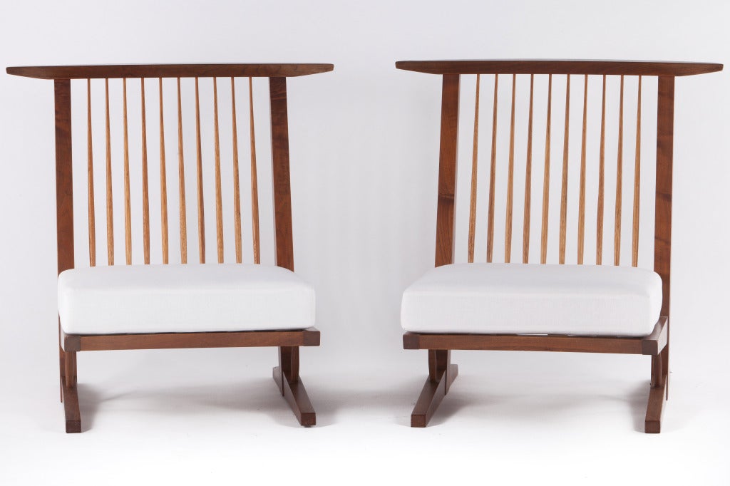 Beautiful pair of George Nakashima conoid lounge chairs circa 1971.Matched pair from original owner. Chairs come with complete provenance. Back cushions included(not pictured).