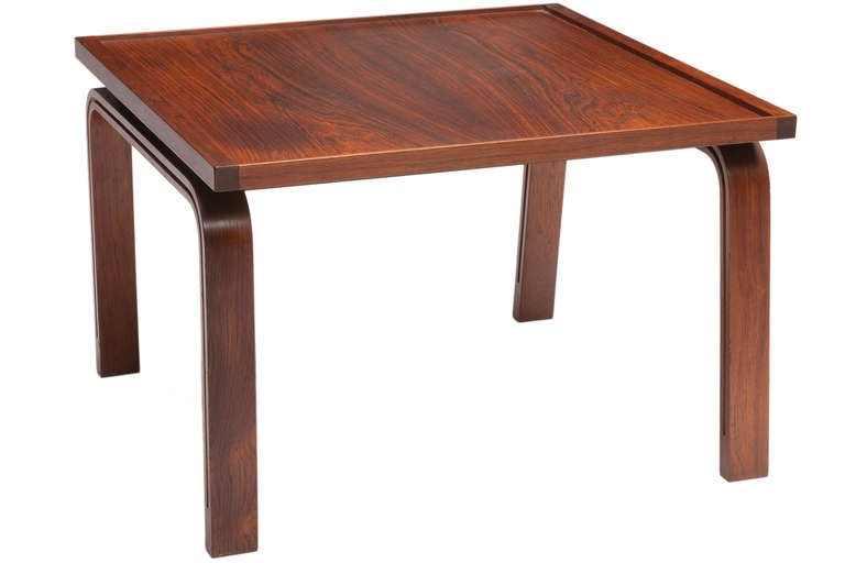 Rare rosewood table or ottoman from St. Catherine's college. Designed by Arne Jacobsen in 1962 for St. Catherine's college in Oxford. Made by Fritz Hansen, Denmark.
