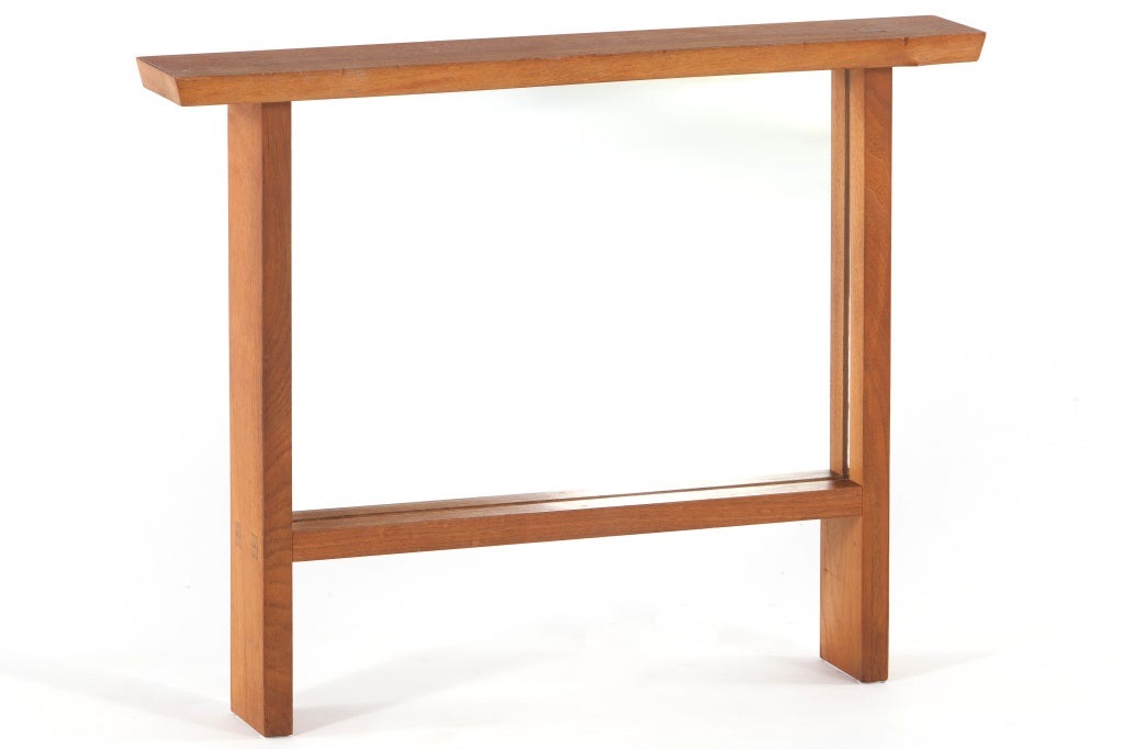 Mirror designed by George Nakashima, executed in 1962 with free edge top, and mortise and tenon joinery. Mirror comes with complete provenance.