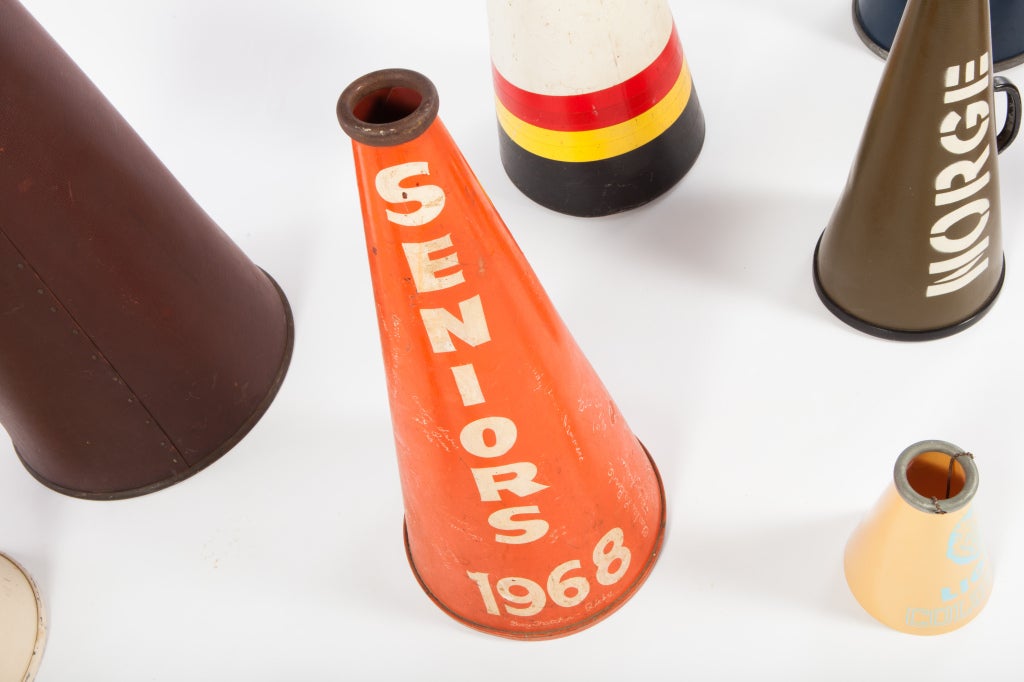 Very colorful and graphic collection of 13 vintage megaphones from the 1940s-1970s. Tallest example measures 38 inches, smallest measuring 8 inches.