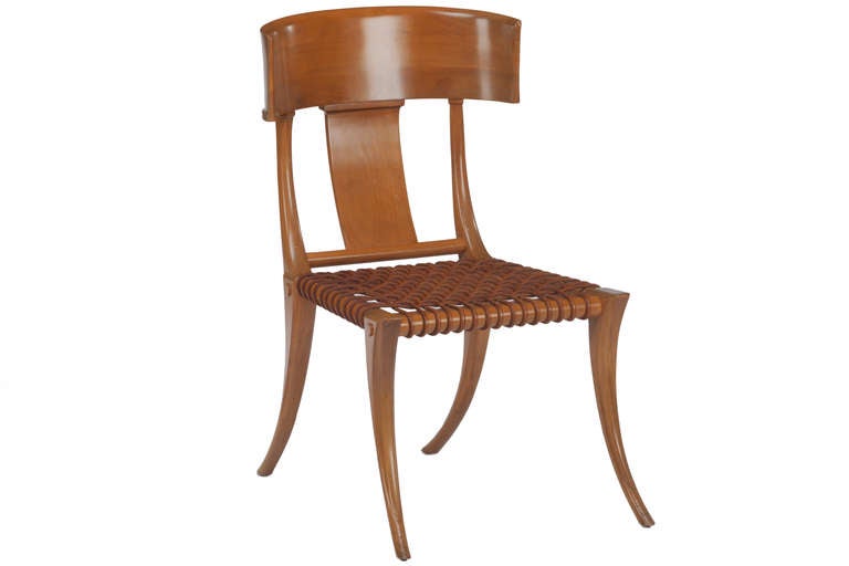 Early Klismos chair Designed by Gibbings and manufactured by Saridis of Athens Greece. Signed. Chair with some minor blemish's and wear to finish.Leather seat is original and perfect.