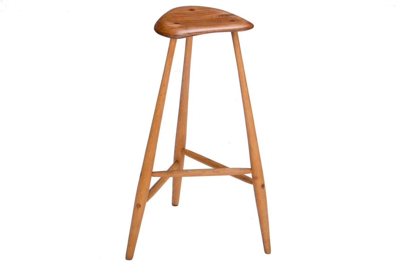 Beautiful Wharton Esherick stool with hickory legs and a sculpted walnut seat signed with carved signature 