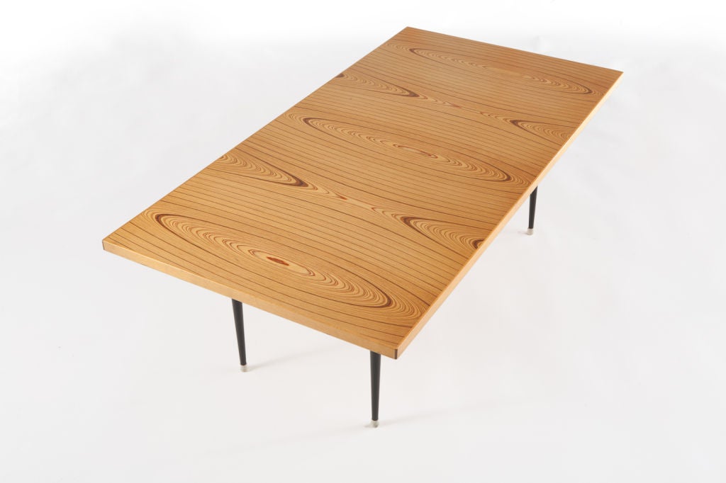 A laminated birch and teak coffee table by Tapio Wirkkala for Asko.