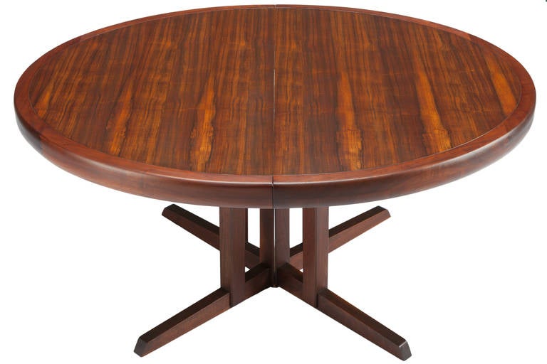 Very rare and large Nakashima rosewood dining table manufactured by Widdicomb, (model #277) and designed in 1958. Table with fine expressive rosewood graining, sawtooth joinery, three leaves and an extendable cluster base. Signed. Table is 5 ft long