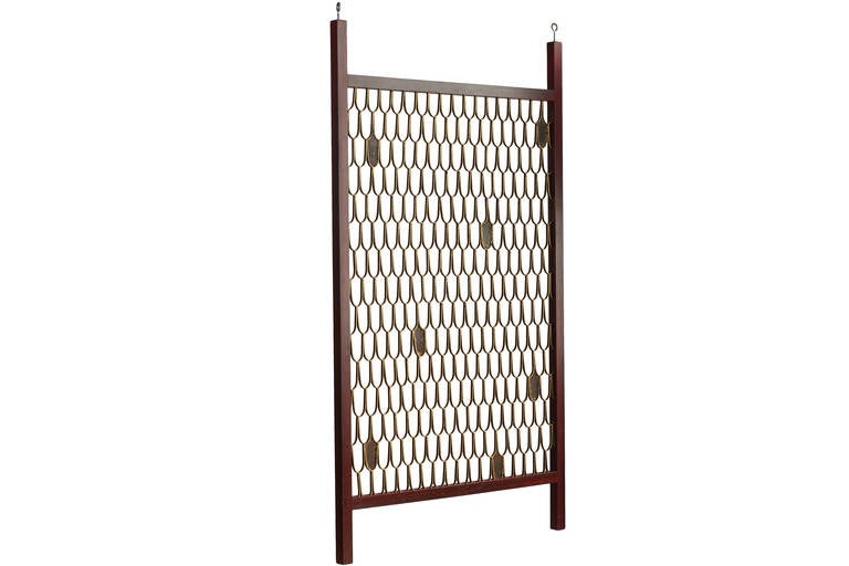 Rare gilded steel and oxblood painted wood room divider by Paul Evans in the looped fish-scale technique. Circa 1960's