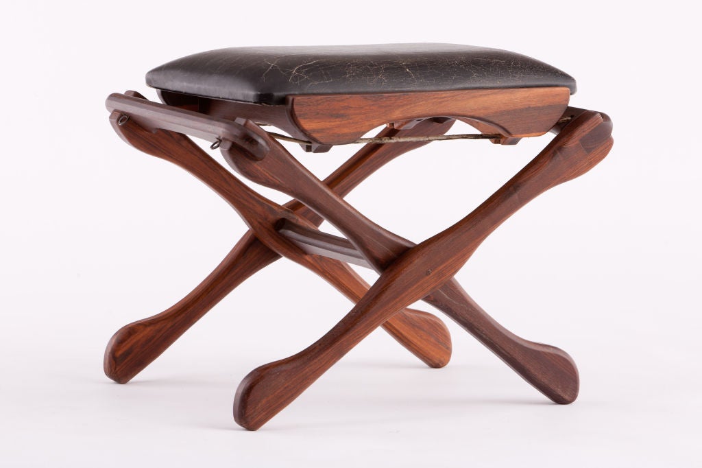 Pair of Rosewood and leather folding stools by Don Shoemaker. Produced in Senal Studios , Mexico
