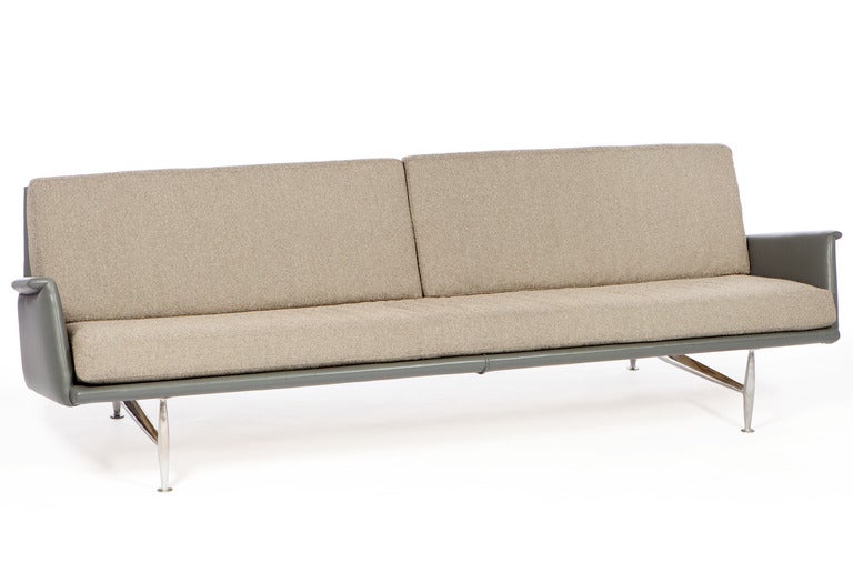 Great modernist sofa by Donald Deskey for Charak Modern. High quality construction with solid polished aluminium legs. Nicely redone in leather and fabric. Interesting later design by one of America's most influential designers.