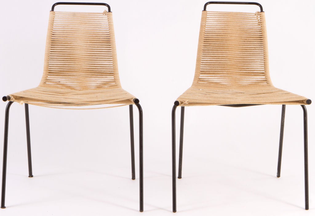 Pair of PK1 chairs designed by Poul Kjaerholm and manufactured by E. Kold Christensen. With original roped seats.