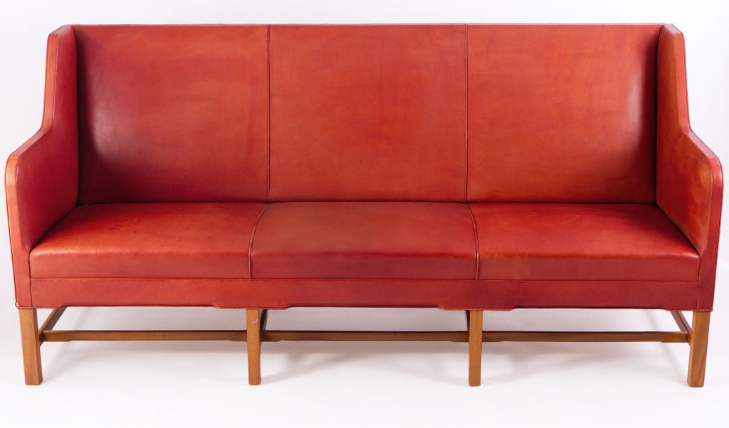 Kaare Klint three-seat sofa in original leather on a Cuban mahogany frame and produced by cabinetmaker Rud Rasmussen.