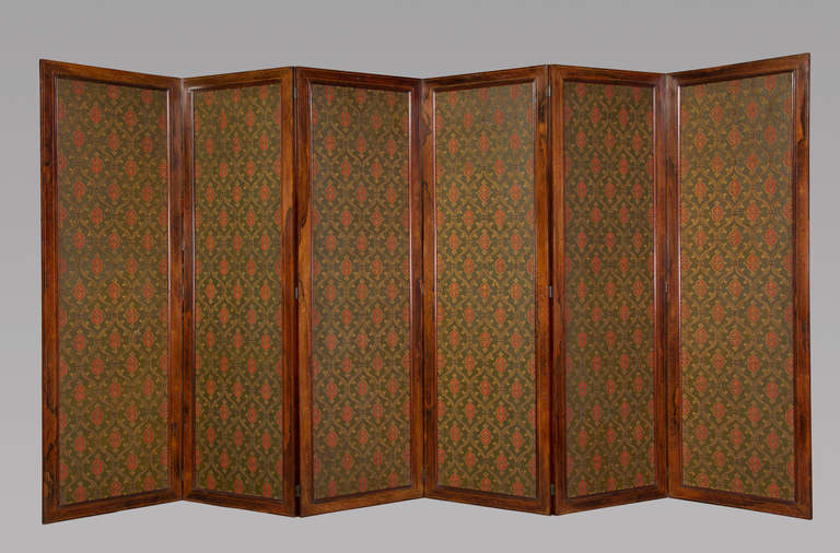 The six rectangular rosewood frames with boxwood line inlay, the canvas screens well painted to the fronts with Gothic imagery.