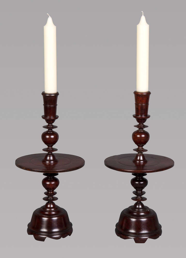 An Impressive Pair of 17th Century Portuguese Colonial Jacaranda Candlesticks In Excellent Condition In New York, NY
