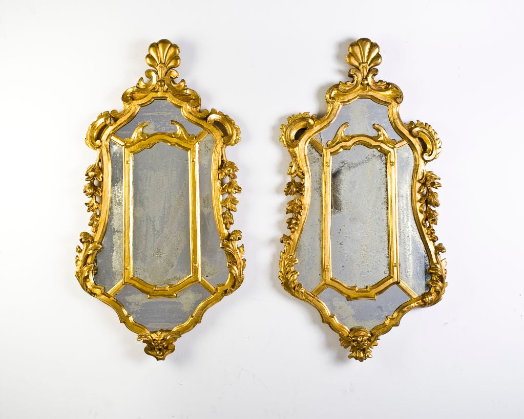 A fine pair of mirrors with an interesting provenance and early 18th century mirror plates. One mirror retains a contemporary hand-written label indicating that the mirrors were in the possession of Martinus a S. Brunone, 1662-1734, author of