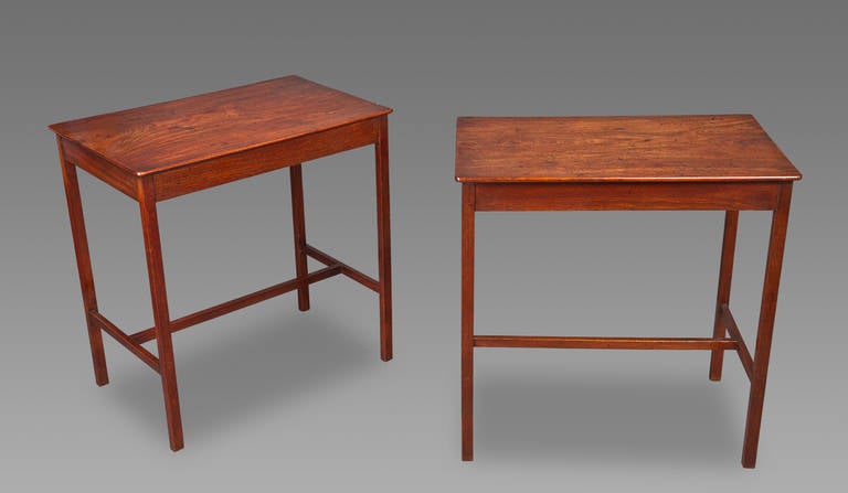 Each rounded rectangular top on square legs joined by H-stretchers, of very good color and construction. These tables although late 18th century have a simple modern contemporary feel to them, and would work well in any interior.